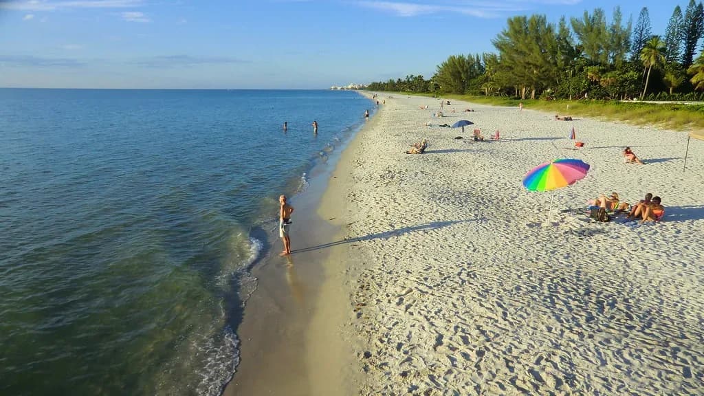 White sand Gulf beach with clear shallow water
